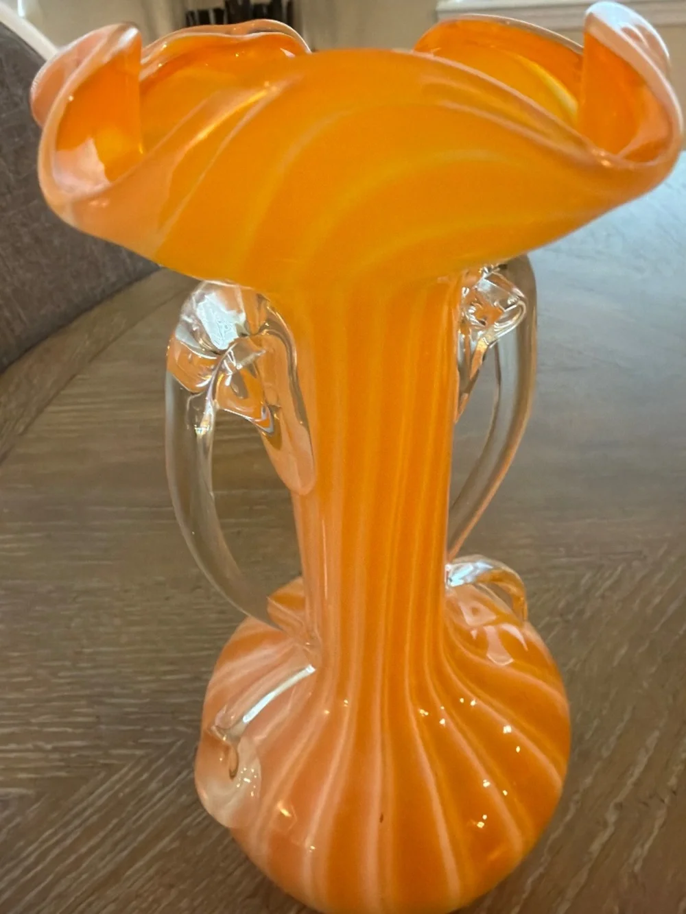 Marano hand blown orange and white vase.